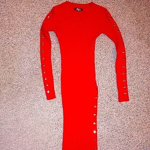 Beautiful bright red sweater dress,with snaps down side.